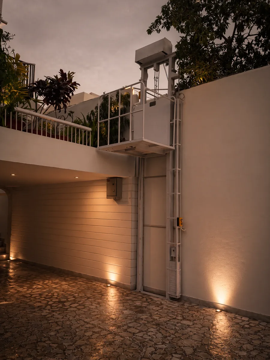 Railing-style residential elevator with open-view design