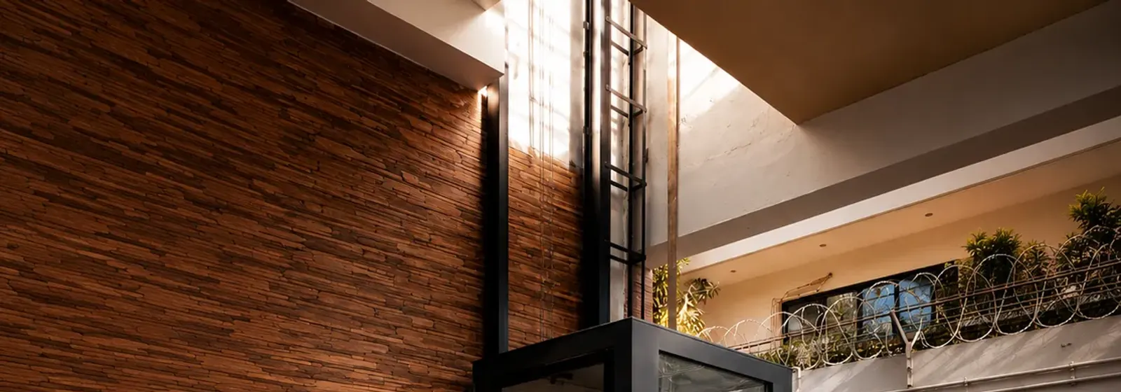 Panoramic glass elevator cabin interior by Vertico Elevators