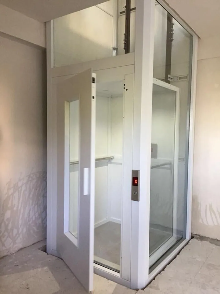 GlassCore full-glass home elevator cabin in a modern living space