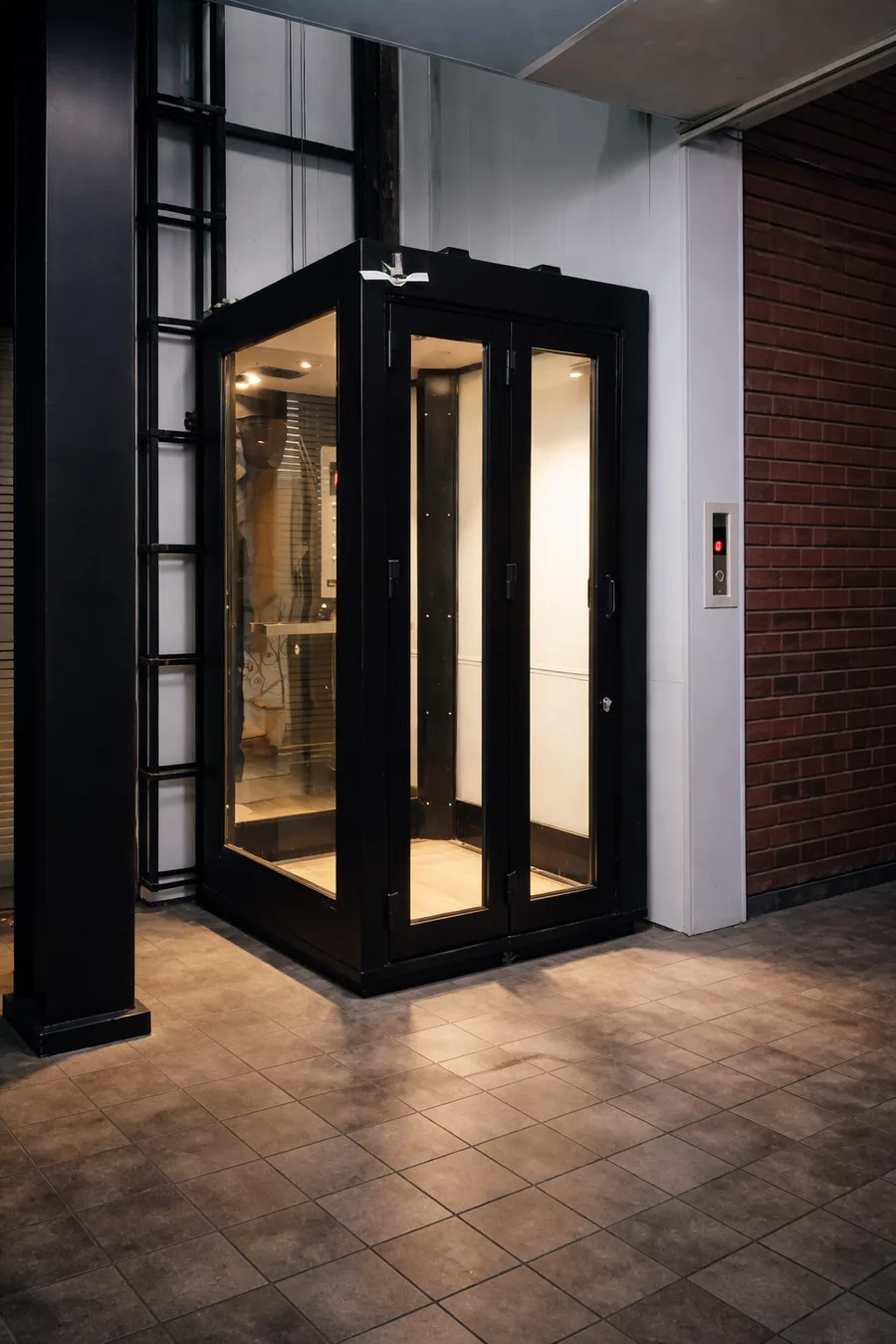 GlassCore glass lift installed in an open industrial-style space