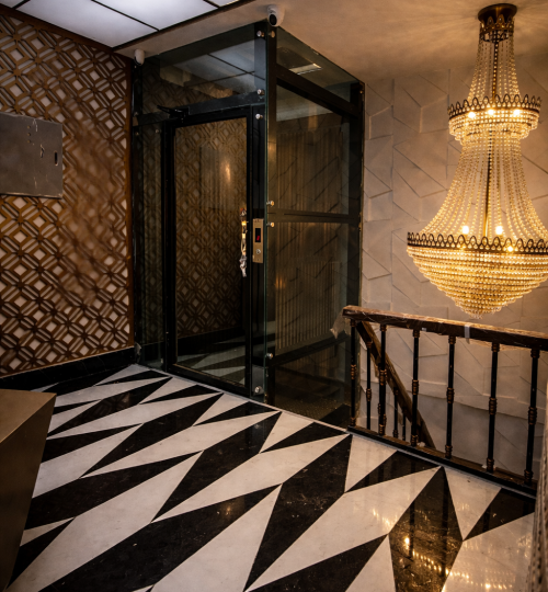Elegant hallway with glass elevar