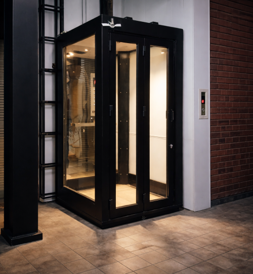 Modern elevator in industrial space