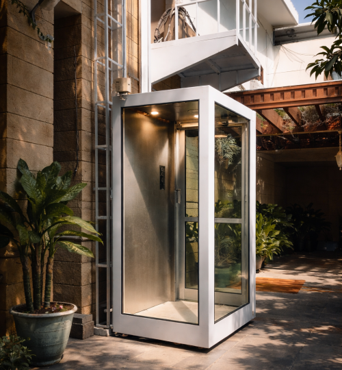 Sleek glass elevator in modern setting